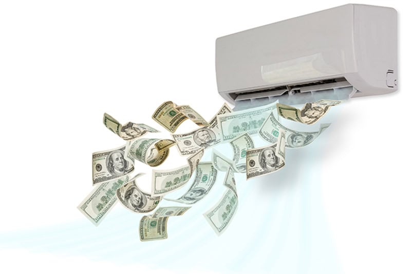 Money spilling out of an AC unit installed on the wall.
